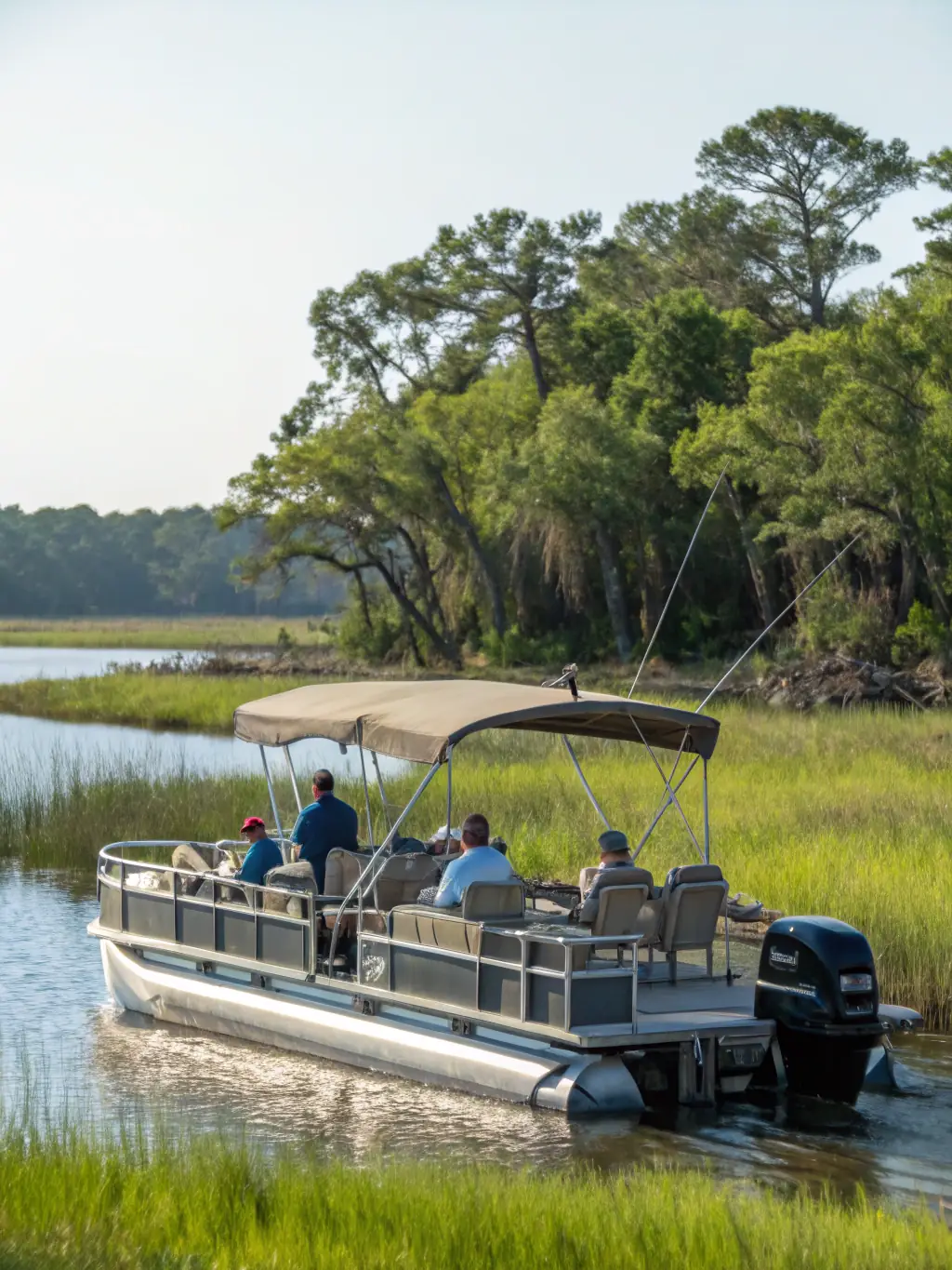 A scenic view of a guided fishing tour on the Orne River, with participants enjoying the natural surroundings and learning about local fish species.